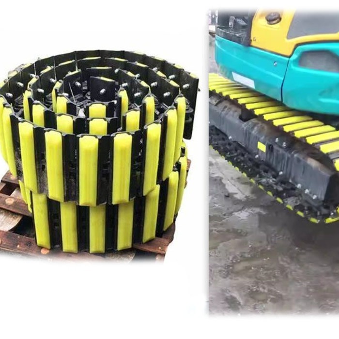 Polyethylene track pads on excavator undercarriage